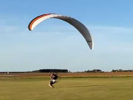 Lonestar Paramotor Instructor Travis Landry launching at Bad Apples 2022!