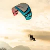 Aerial view of a paramotor pilot in flight using ITV Piper paramotor wings.