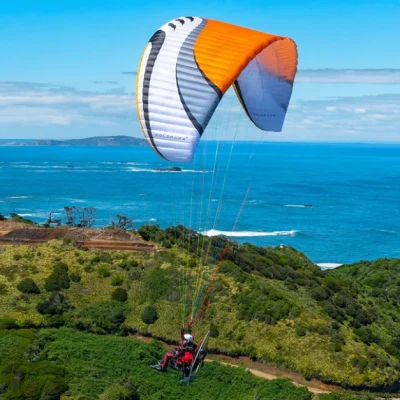 Aerial image of a paramotor pilot flying with MAC PARA Colorado 2 wings.