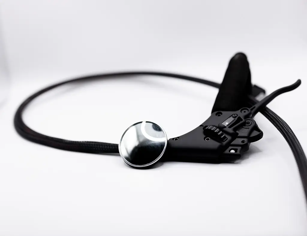 A mirror accessory to attach to a paramotor throttle
