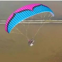 Aerial shot of a Ozone Mojo PWR 2 paramotor wing in flight.