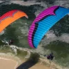 Aerial shot of a Ozone Mojo PWR 2 paramotor wing in flight.