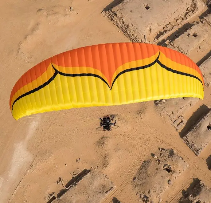 Aerial image of the Ozone Roadster 3 paramotor wing in flight.
